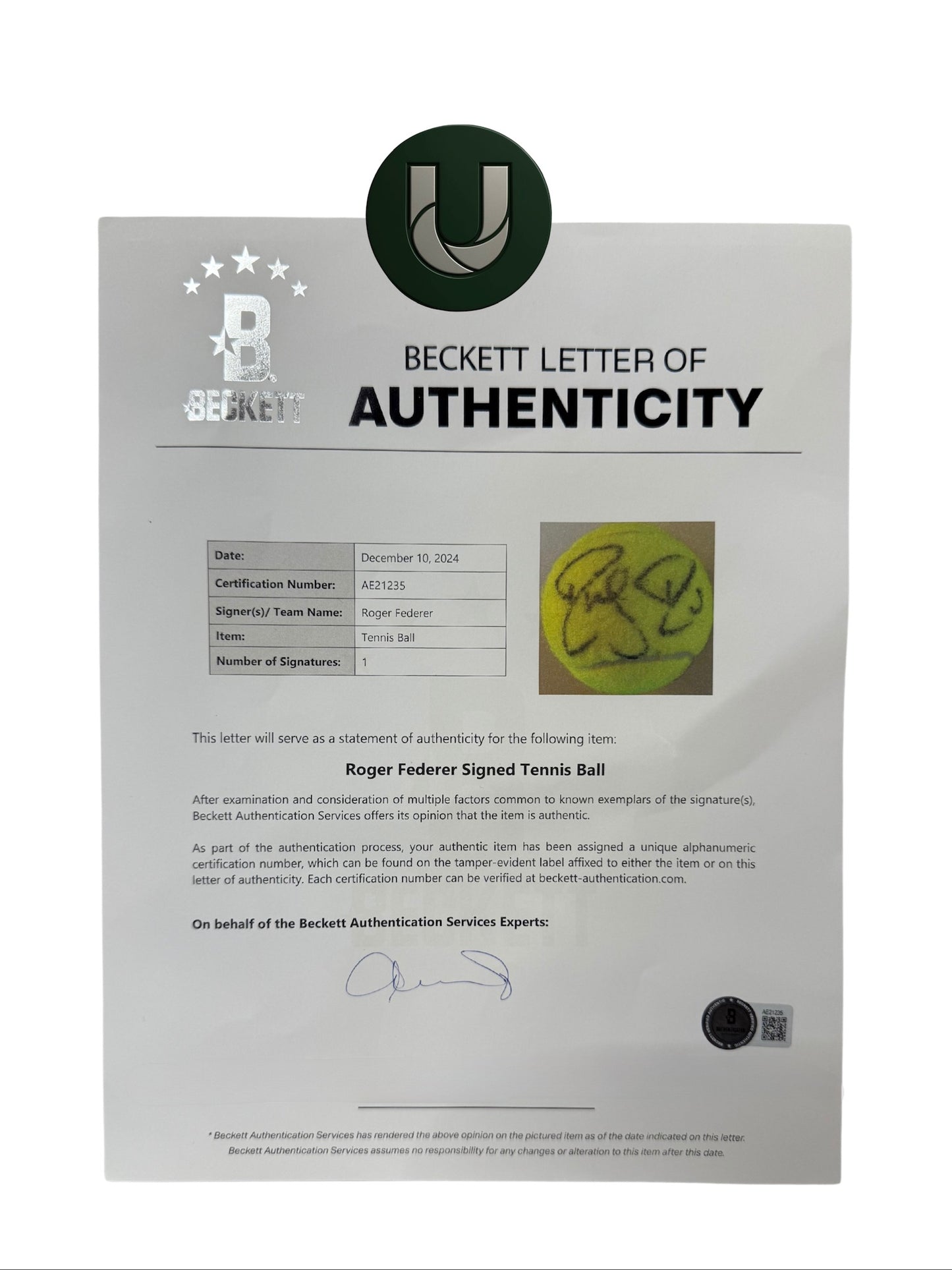 Pelota firmada por Roger Federer