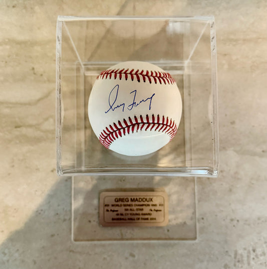 Pelota autografiada por Gregory Alan Maddux (The Professor)